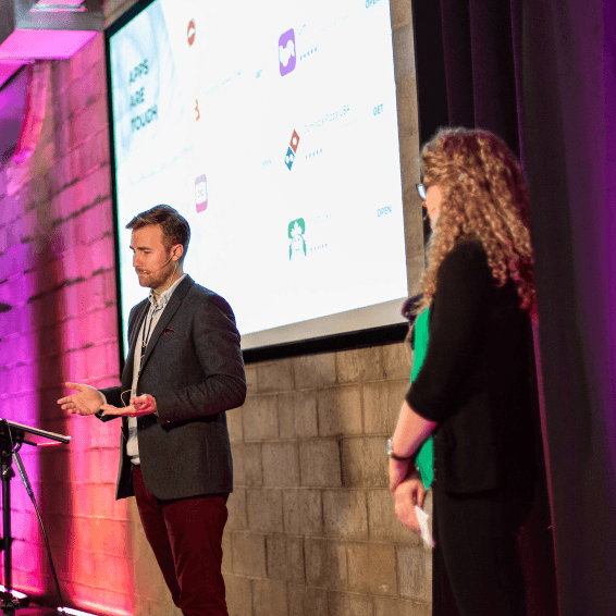 Two speakers presenting at FusionConf