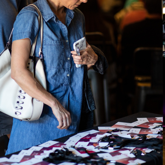 Attendee browsing badges at registration